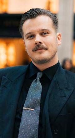 Porträtt av Douglas Holm, Head of online på Myrqvist.